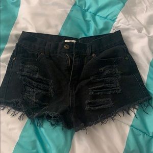 Distressed festival jean shorts